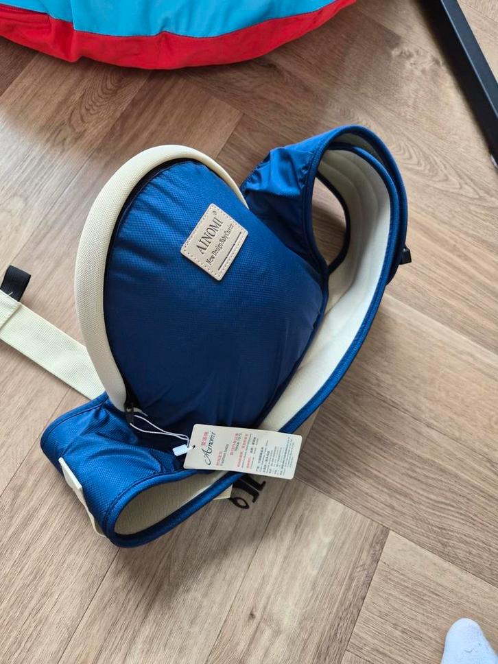 Heupdrager - Ainomi - Nieuw!, Kinderen en Baby's, Babydragers en Draagdoeken, Nieuw, Draagzak, Zij, Overige merken, Ophalen of Verzenden