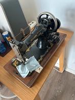 Antieke Phoenix Naaimachine, Ophalen