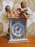 Klokje met engeltjes., Antiek en Kunst, Antiek | Klokken, Ophalen of Verzenden