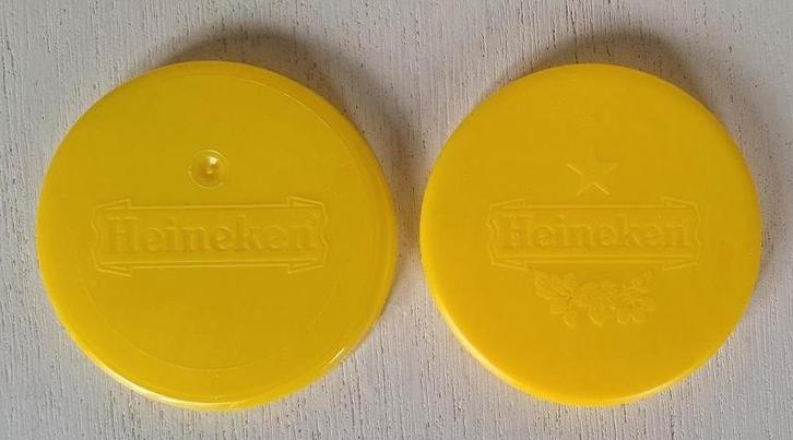 Heineken Bierfust afdekkapjes 2 verschillende., Verzamelen, Biermerken, Gebruikt, Reclamebord, Plaat of Schild, Heineken, Ophalen of Verzenden