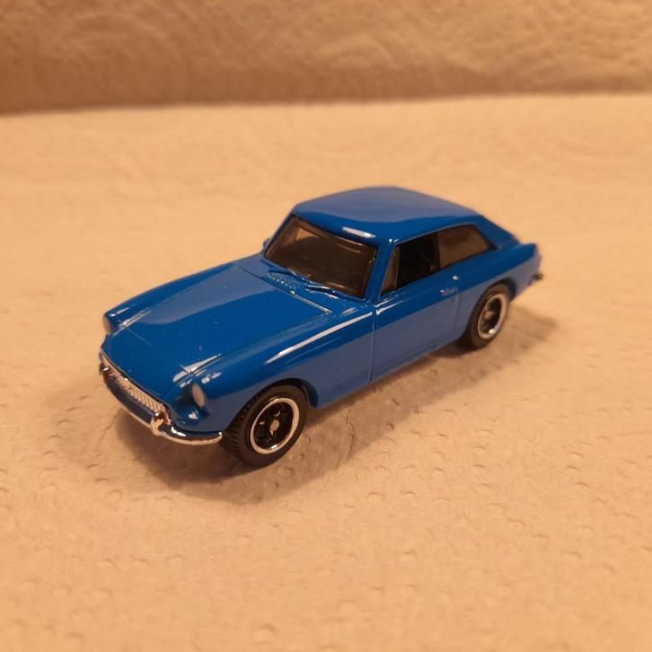 Matchbox MGB GT blauw. Chrome base., Hobby en Vrije tijd, Modelauto's | Overige schalen, Nieuw, Auto, Ophalen of Verzenden