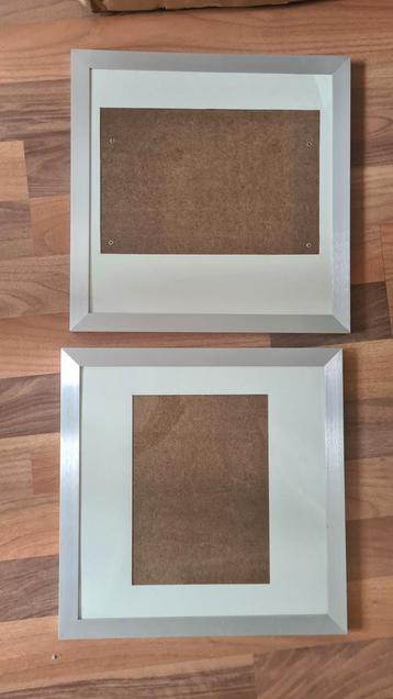 2 aluminium fotolijsten 45x45 cm beschikbaar voor biedingen