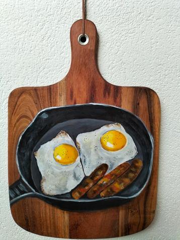 Schilderij op hout eitjes en worstjes in de pan  beschikbaar voor biedingen