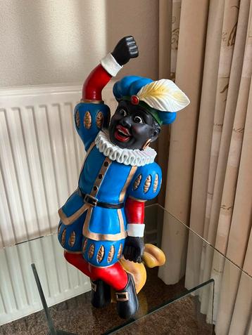 Te koop beeld hangende Zwarte Piet beschikbaar voor biedingen