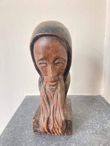Houten heiligenbeeldje beschikbaar voor biedingen