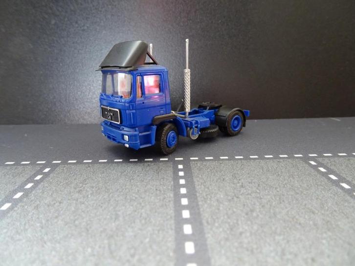 933 herpa man f90 dagcabine blauw 2-as trekker 1:87 truck, Hobby en Vrije tijd, Modelauto's | 1:87, Zo goed als nieuw, Bus of Vrachtwagen