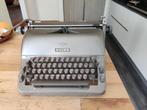 Vintage Adler typemachine, Ophalen