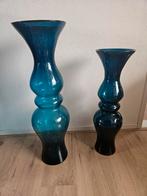 Twee grote blauwe vazen, Ophalen
