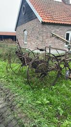 Antiek hooischudder paard, Ophalen