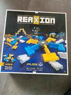 Reaxion - speelgoed bouwen/ domino, Kinderen en Baby's, Speelgoed | Bouwstenen, Ophalen of Verzenden, Gebruikt