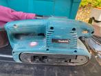 Makita 9911 bandschuurmachine, Doe-het-zelf en Verbouw, Ophalen of Verzenden, Gebruikt, 600 tot 1200 watt, Bandschuurmachine