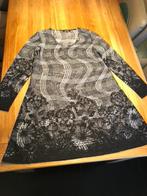 Nieuw zwart/wit semi-transparant Twister jurkje, mt 1 = 42, Kleding | Dames, Verzenden, Zwart, Maat 42/44 (L), Nieuw