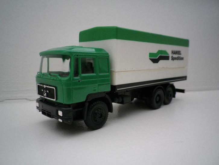 Herpa MAN F90  huif bakwagen Hanniel, Hobby en Vrije tijd, Modelauto's | 1:87, Zo goed als nieuw, Bus of Vrachtwagen, Herpa, Ophalen of Verzenden