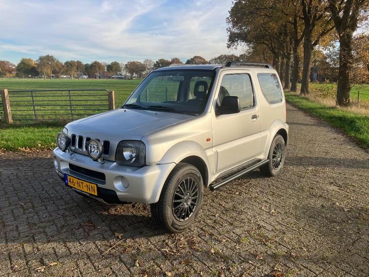 Suzuki Jimny 1.3 JX 4WD 2004 Airco Zeer netjes!, Auto's, Suzuki, Particulier, Jimny, 4x4, Airbags, Airconditioning, Alarm, Dakrails