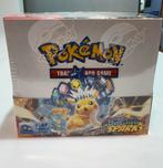 Surging Sparks Boosterbox Pokemon, Ophalen of Verzenden, Nieuw, Boosterbox, Foil
