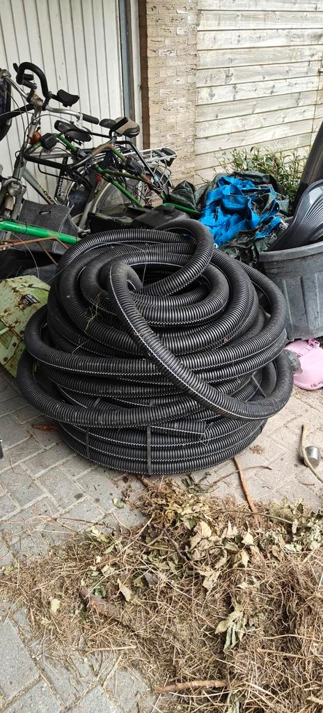 Mantelbuis 63mm met trekkoord, Tuin en Terras, Tuinslangen, Zo goed als nieuw, Tuinslang, Ophalen of Verzenden