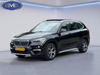 BMW X1 SDrive20i 192 pk High Executive, panoramadak, trekhaa, 1998 cc, Euro 6, Leder en Stof, Zwart