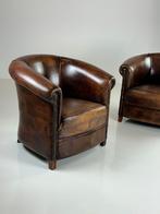 Schapenleren clubfauteuils set van 2 donker