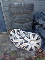 Winterbanden en velg 205/55 R16 RenaultMegane met wieldoppen, Auto diversen, Wieldoppen, Ophalen, Gebruikt