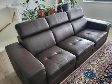 lederenbank met relax gedeelten beschikbaar voor biedingen