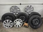 Winterbanden Peugeot 107, wielmoeren en doppen, Ophalen, 14 inch, Gebruikt, 155 mm