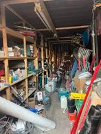 Zeecontainer (mobiele opslag) met stellingen en electra, Ophalen