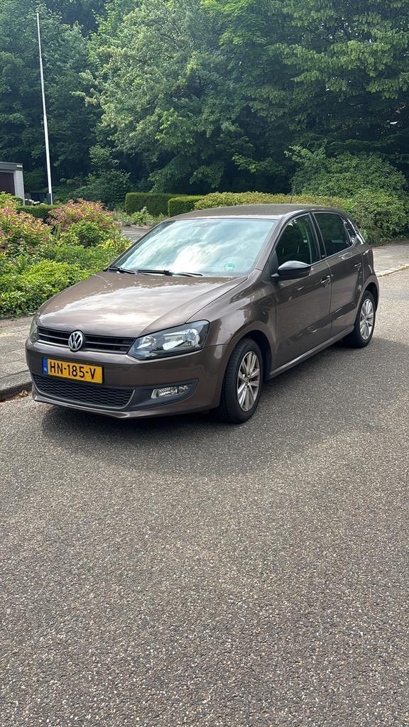 Volkswagen Polo 1.2 51KW 2011 Bruin, Auto's, Volkswagen, Particulier, Polo, Airbags, Airconditioning, Bluetooth, Centrale vergrendeling