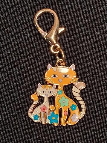 bedel / hangertje katjes oranje créme beschikbaar voor biedingen