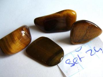 tijgeroog op foto1 samen 0,69 trommelstenen tiger eye kwarts beschikbaar voor biedingen