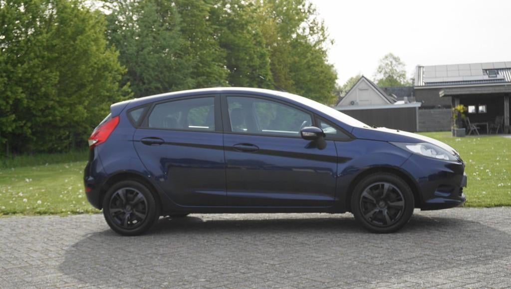 Ford Fiesta 1.25 Limited 5 Drs Airco trekhaak, Auto's, Ford, Voorwielaandrijving, Euro 5, Stof, 4 cilinders