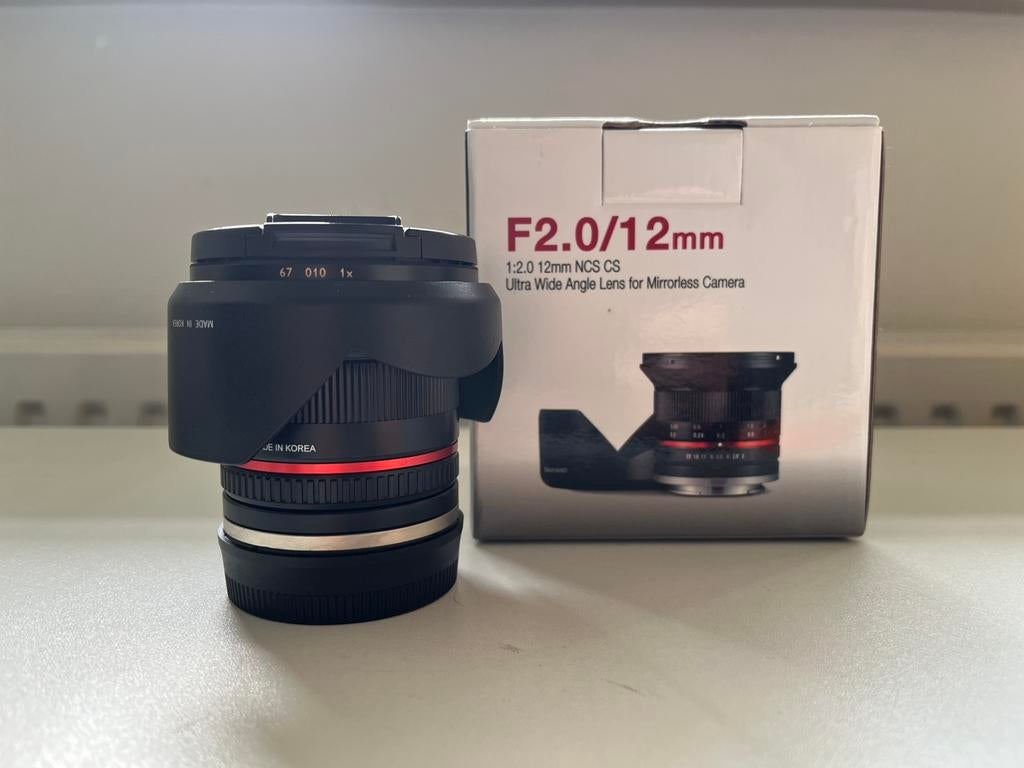 Samyang F2.0/12mm Ultra Wide Angle Lens E-mount + Garantie, Ophalen of Verzenden, Gebruikt, Groothoeklens