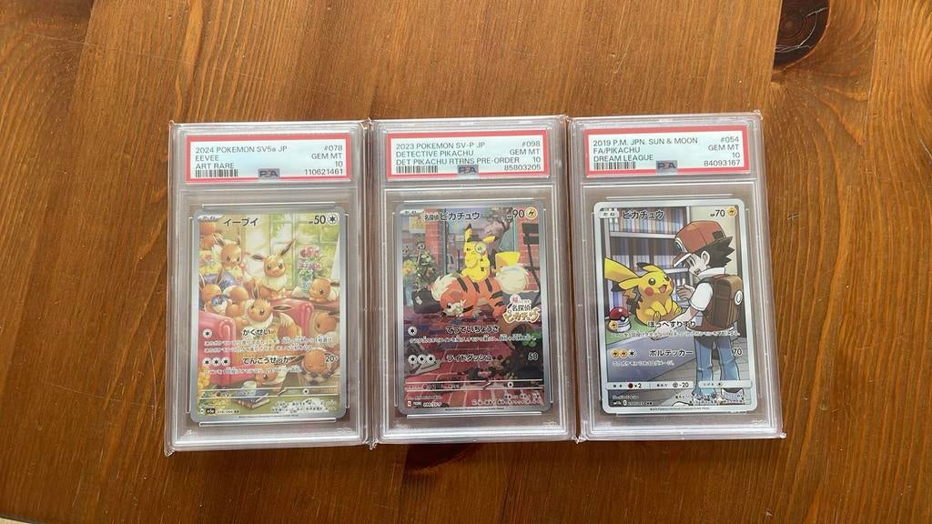 3x PSA 10 Pokémon kaarten: Eevee, Detective Pikachu, Pikachu, Hobby en Vrije tijd, Verzamelkaartspellen | Pokémon, Ophalen of Verzenden