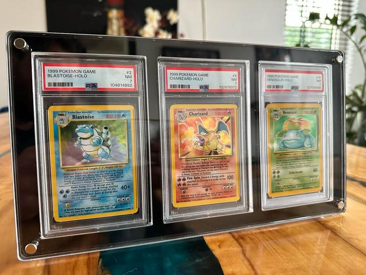 Pokémon PSA 7 1999 Charizard, Venusaur, Blastoise Set, Hobby en Vrije tijd, Verzamelkaartspellen | Pokémon, Zo goed als nieuw