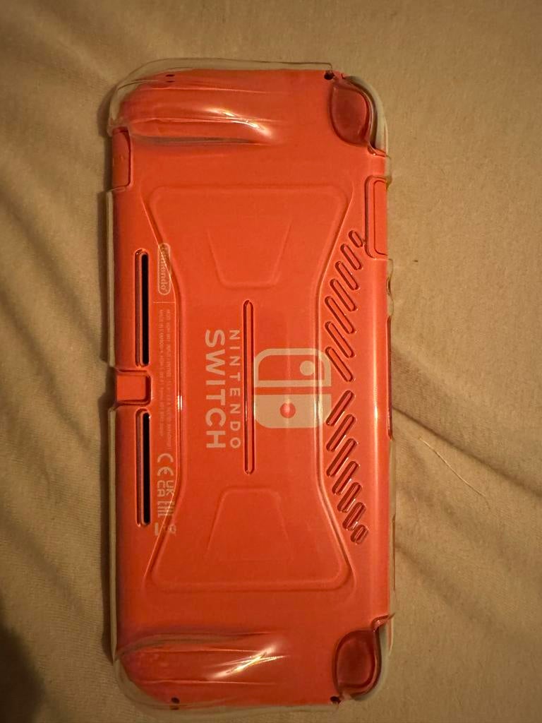 Nintendo Switch Lite Coral - Zo goed als nieuw, Spelcomputers en Games, Spelcomputers | Nintendo Switch Lite, Zo goed als nieuw