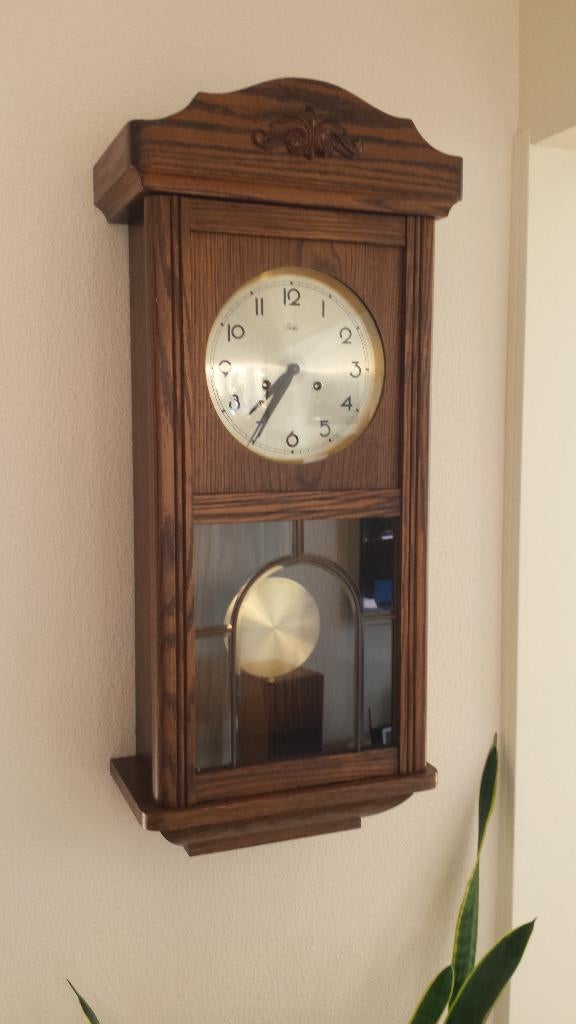 Antieke wandklok, Ophalen
