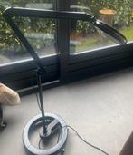 Zwarte loupelamp, Ophalen