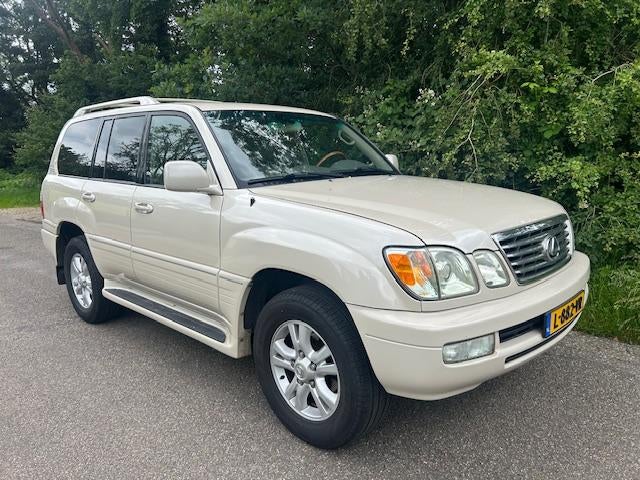 Lexus LX470 V8 Benzine ( Toyota Landcruiser 100 ) 7 Persoons, Auto's, Lexus, Te koop, Overige modellen, Lichtmetalen velgen, Mistlampen