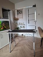 Trimtafel voor huisdieren, Ophalen