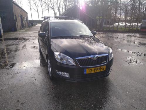 Skoda Fabia 1.2 TDI 55KW Combi 2011 Zwart, Auto's, Skoda, Particulier, Fabia, ABS, Airbags, Airconditioning, Bluetooth, Centrale vergrendeling