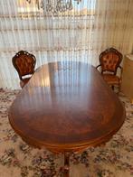 Antieke houten tafel met sierlijke details, Ophalen