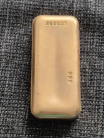 Decoratieve flesopener, ziet er uit als goudbaar beschikbaar voor biedingen