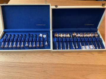 Twee setjes van zilver lepeltjes en vorkjes vlammetje VK. beschikbaar voor biedingen
