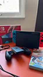 Nintendo Switch OLED + Pokémon Shield, Spelcomputers en Games, Games | Nintendo Switch, Online, 1 speler, Zo goed als nieuw, Vanaf 7 jaar