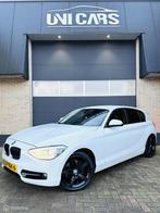 BMW 1-serie 118i 170 PK Sport|Automaat|Xenon|Navi|LM 17, Gebruikt, Zwart, 4 cilinders, 1290 kg