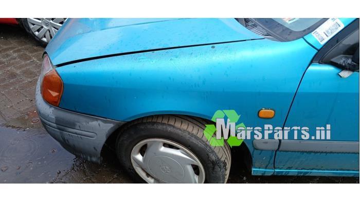 Scherm links-voor van een Toyota Starlet (756), Auto-onderdelen, Carrosserie en Plaatwerk, Toyota, Gebruikt, 3 maanden garantie