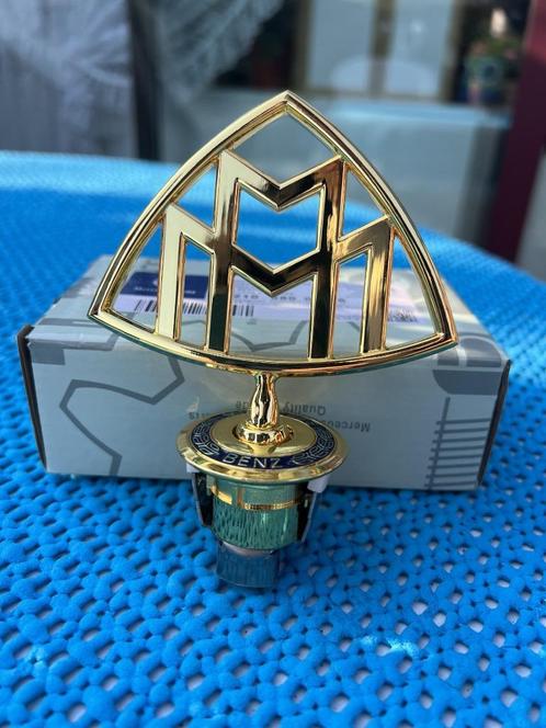 MERCEDES BENZ MAYBACH STER RVS GOLD LAUWERKRANS OP DE VOET, Auto diversen, Wieldoppen, Nieuw, Ophalen of Verzenden