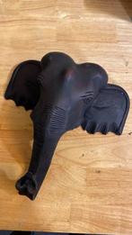 Olifant kop van steen, Ophalen