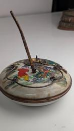 opiumpijp porselein, Ophalen