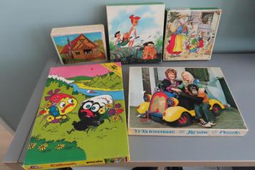Diversen puzzels o.a. Tita tovenaar, Calimero Flintstones beschikbaar voor biedingen