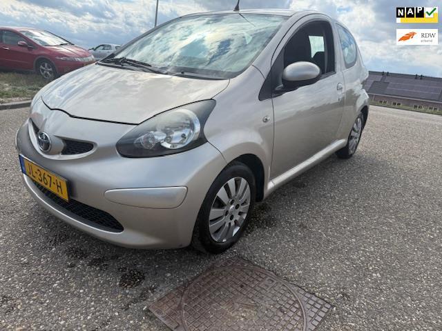 Toyota Aygo 1.0-12V + Airco HalfLeder Onderhouden Velg Toere, Auto's, Toyota, Bedrijf, Te koop, Aygo, ABS, Airbags, Airconditioning
